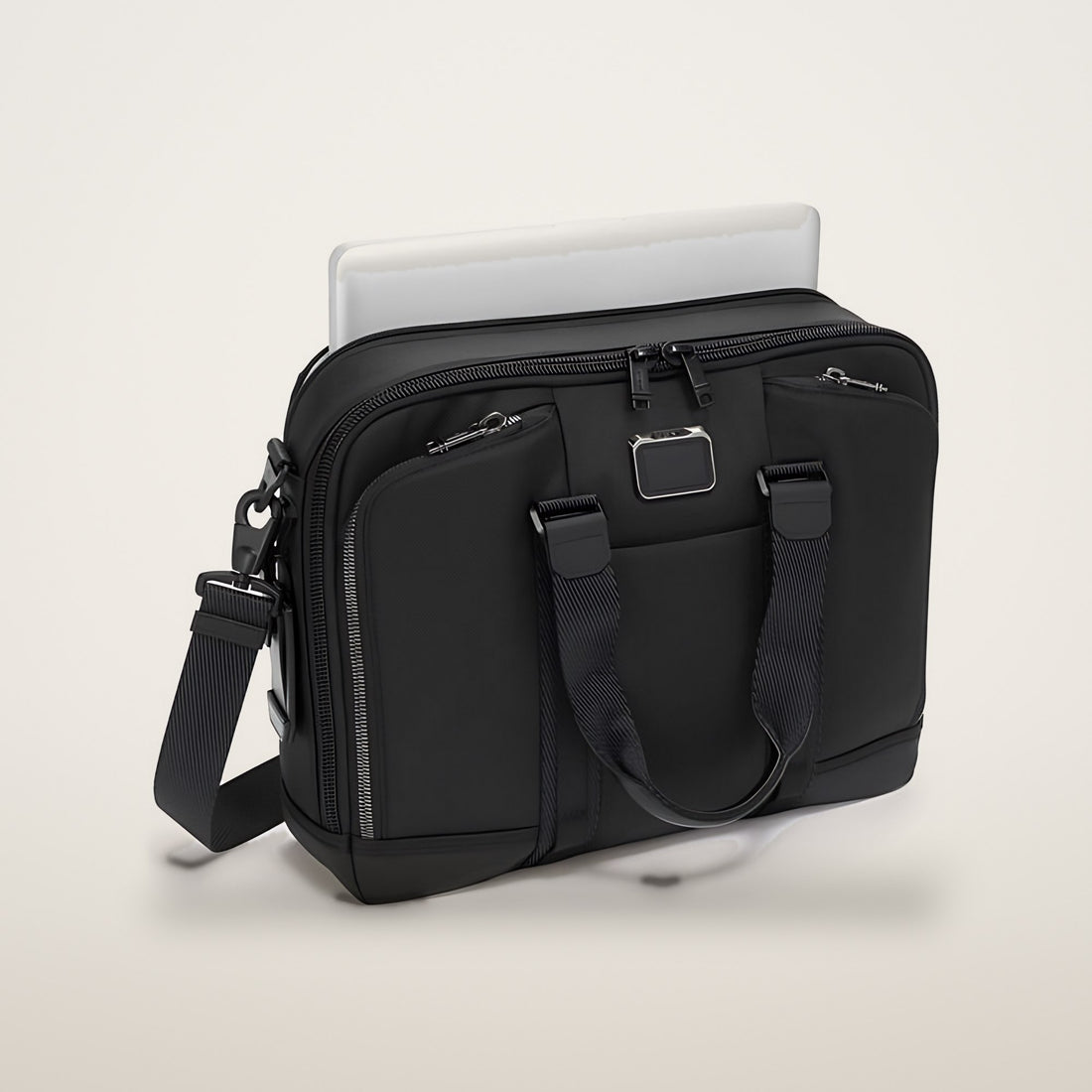 TUMI Advanced Brief laptop lomme